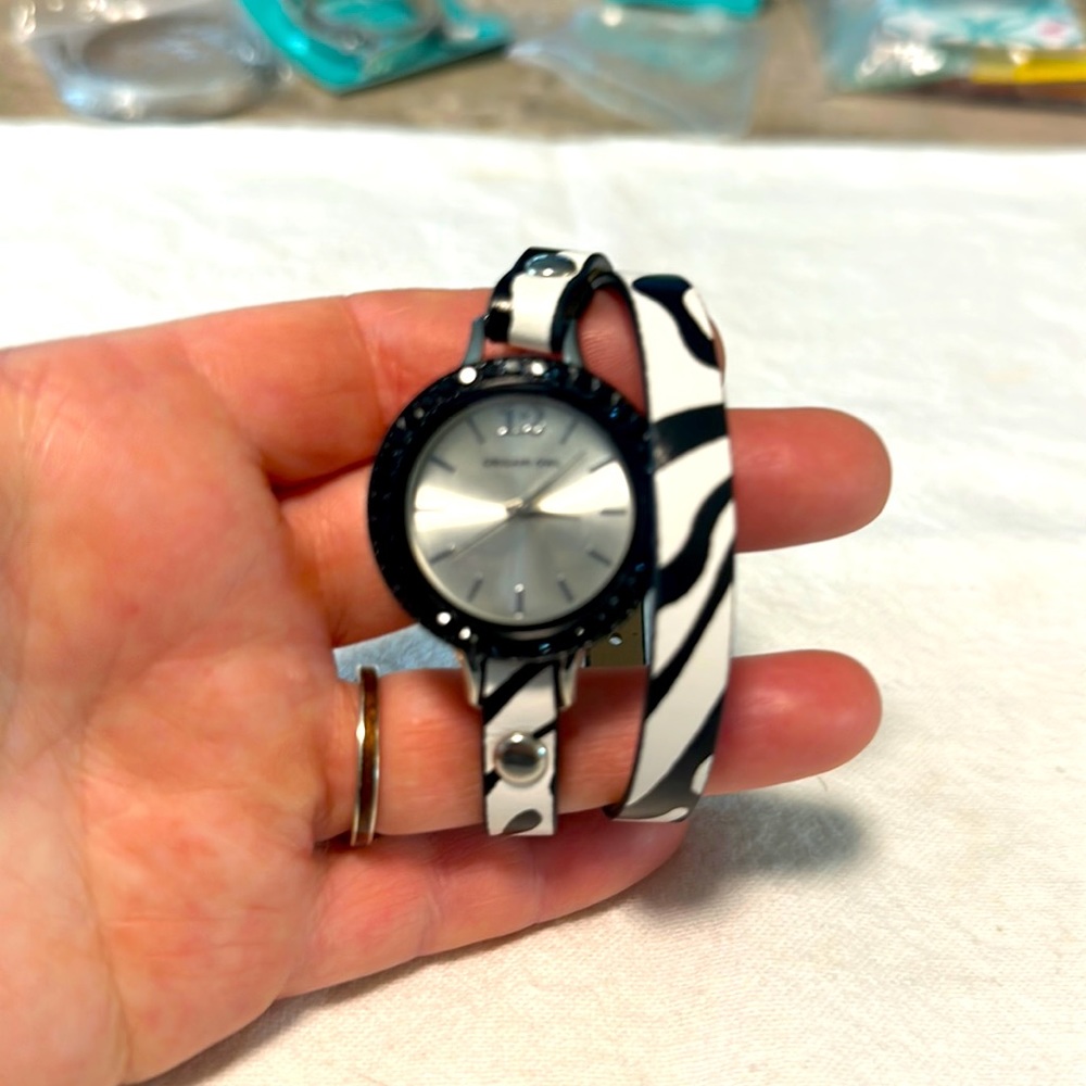Origami Owl Watch w/zebra wrap & black rhinestone face. Battery tab never remove
